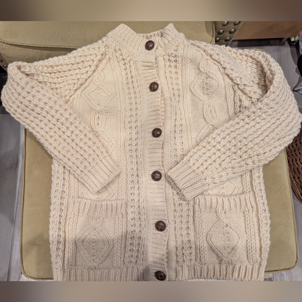 Classic Aran cable knit with textured sleeves & bold diamond cables 100 Wool